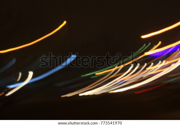 \
abstract\
background of multi-colored electric\
lights