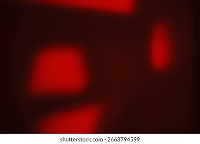 Abstract background with multiple soft red light spots. This organic, moody pattern on a dark canvas creates a mysterious and atmospheric texture.