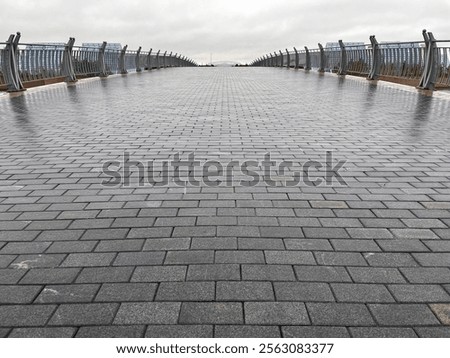 Abstract background. New cobblestone pavement close up.