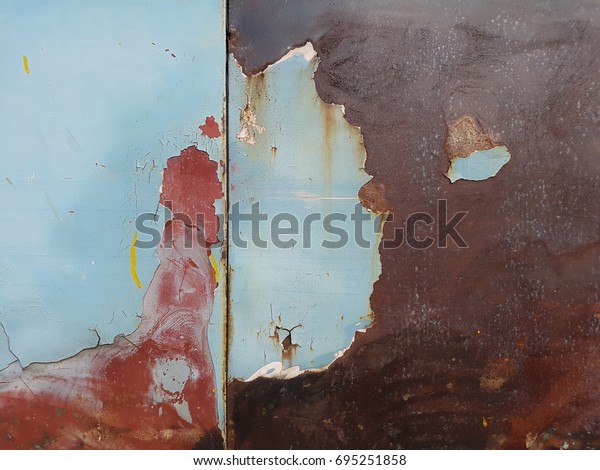 Abstract and background for the old body\
panel car and was rust and paint peeling\
out