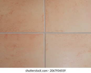 Abstract background with orange terracotta tiles, copy space