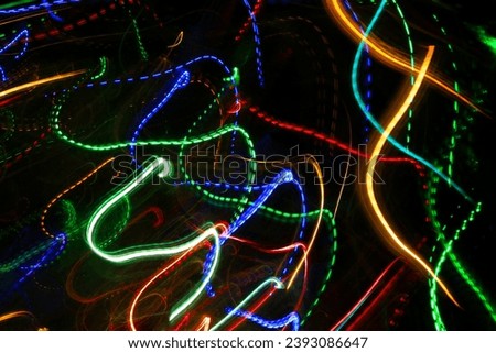 Abstract background with pattern from colorful traces or trajectory of lights