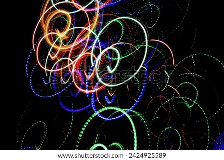 Abstract background with pattern from colorful traces or trajectory of lights