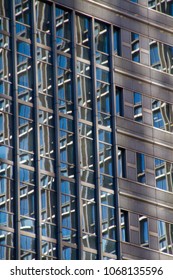 Abstract background pattern. Windows and walls of buildings. Strong lines and rectangular shapes.