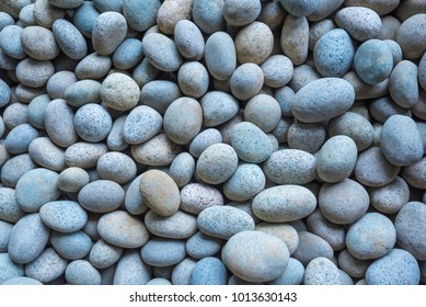 Abstract background from pebbles pattern on the beach. Natural and environment background. Picture for add text message. Backdrop for design art work.
