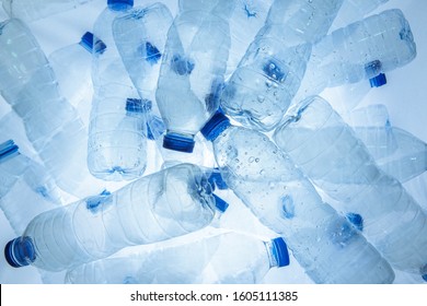 Abstract Background Of Plastic Bottles (Polyethylene Terephthalate Or PET Bottle). Global Warming And World Environmental Concept