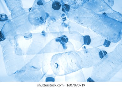 Abstract Background Of Plastic Bottles (Polyethylene Terephthalate Or PET Bottle). Global Warming And World Environmental Concept