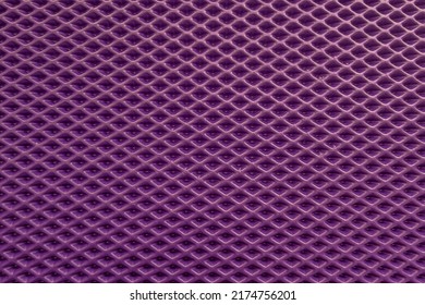 Abstract Background Of Purple Embossed Plastic Surface Close Up