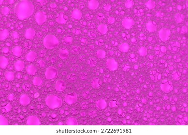 Abstract background red soap macro Colorful artistic of oil drop floating on the water. macro red bubble oil of wallpeper, 