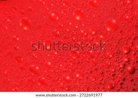 Abstract background red soap macro Colorful artistic of oil drop floating on the water. macro red bubble oil of wallpeper, 