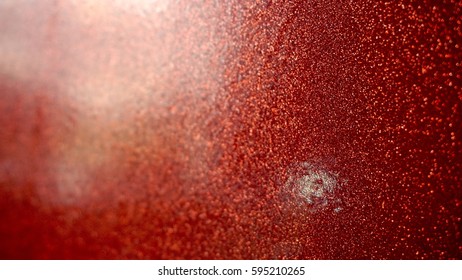 Abstract background red sparkly panel. Light                 
