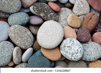 abstract background with round pebble stones. Vacation holiday recreation on beach concept.
