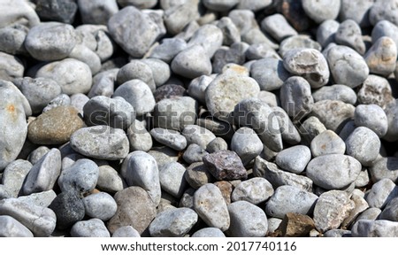 abstract background with round pebble stones. Vacation holiday recreation on beach concept. High quality photo