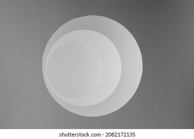 Abstract Background With Round Tunnel Or Way Of Grey Circles With Light, Shadow, Shift, Perspective, Scene In Simple Geometric Style.