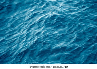 An abstract background of seawater flow under light exposure - Shutterstock ID 1878980710