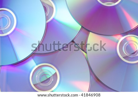 Abstract background from several colored DVD disks