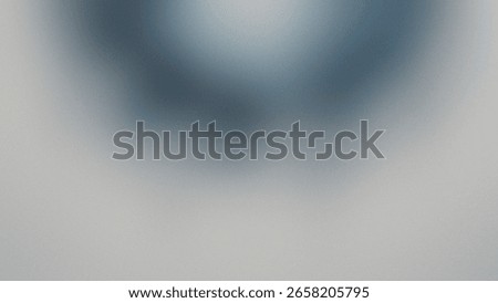 Abstract background with a soft, blurred gradient of blue and grey tones, creating a calming and ethereal atmosphere.