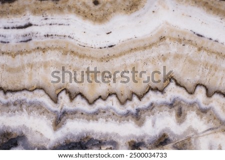 Abstract background. The stone is agate. Stone cut pattern agate, onyx.