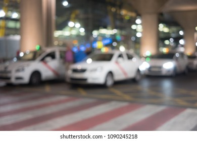 Abstract Background Of Taxi Blur Bokeh In Airport Parking Lot