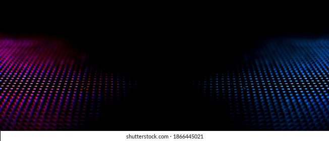Abstract background texture of CloseUp LED light panel art soft focus blurred screen with dark black shadow space  for text.