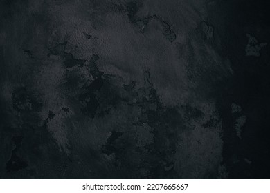 Abstract Background Texture Of A Dark Stone Similar To The Lunar Surface. Texture Of Black Matter.