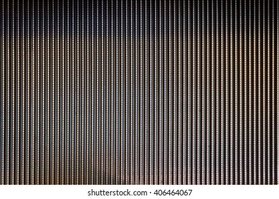 Abstract background texture of striped pattern of metal escalator foot step