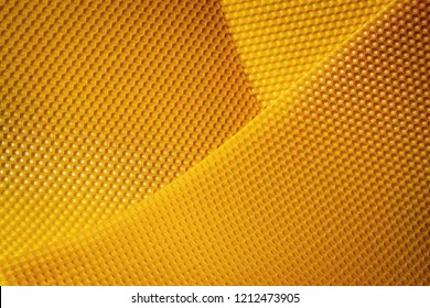 abstract background or texture background of yellow wax honeycomb