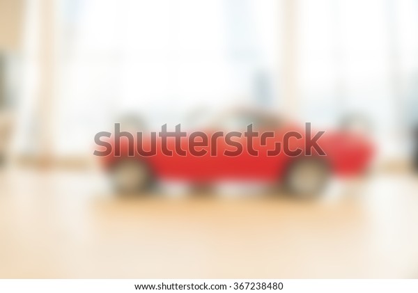 Abstract background of undefined \
blurred  retro vintage cars in abstract dealership\
place