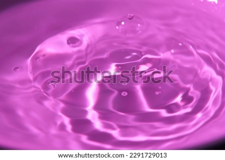 An abstract background of undefined shapes with various shades and waves, Wallpaper.Concentric circles, madness, undefined shapes, waves, blue, green, magenta, cyan, blue, green magenta cyan