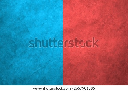 Abstract background with vivid split colors blue and red textured wall in half and half layout. Perfect for comparison graphics presentations or creative designs with contrast.