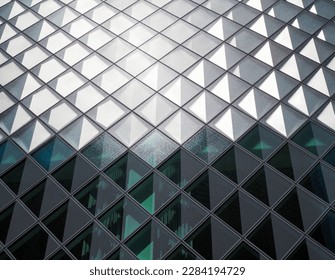 an abstract background a wall with glass in squares and reflections light and dark - Powered by Shutterstock