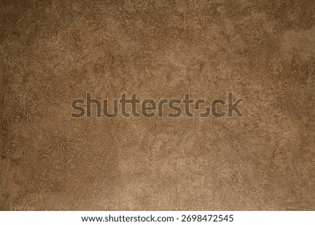 abstract background in warm, medium brown tones with heavy distressing and organic color variation. The rough, moody surface is ideal for rustic product photography
