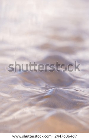 Abstract background of water ripples in the sea, shallow dof