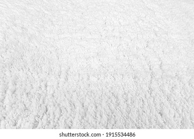 abstract background white fur on a knitted basis close up