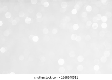 Abstract background with a white light blur .