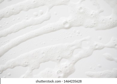 Abstract Background White Soapy Foam Texture. Shampoo Foam With Bubbles