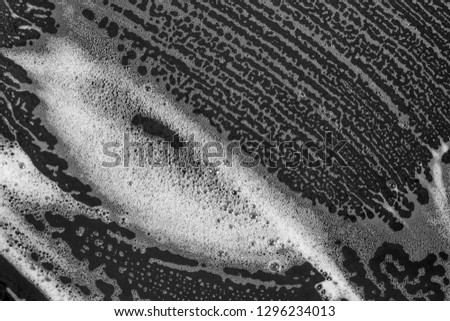 Abstract background white soapy foam texture. Shampoo foam with bubbles