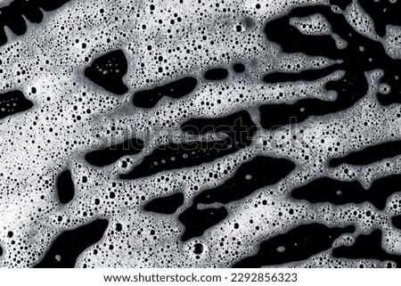 Abstract background white soapy foam texture. Shampoo foam with bubbles
