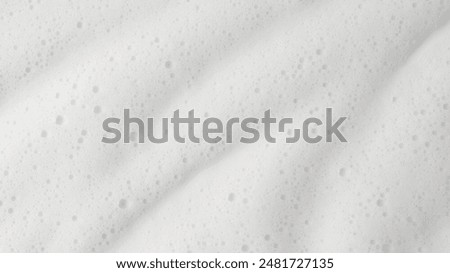 Abstract background white soapy foam texture. Shampoo foam with bubbles