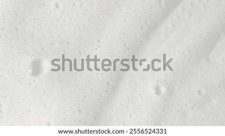 Abstract background white soapy foam texture. Shampoo foam with bubbles