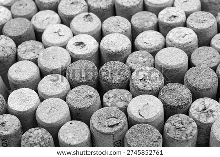 Abstract background of wine corks with corks from red wine bottles and corks from white wine bottles among other wine corks