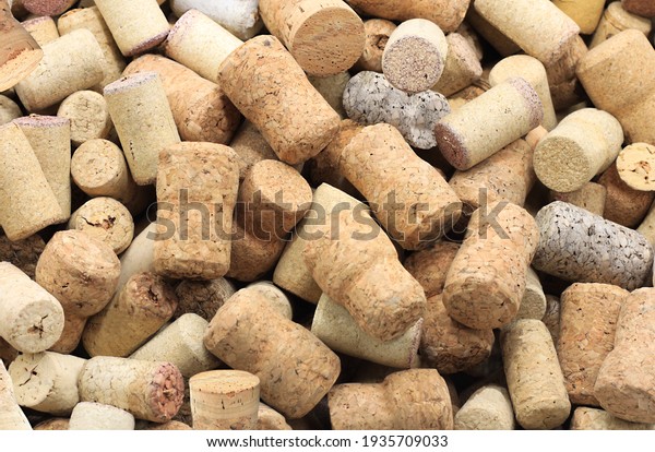 Abstract\
background with wine corks from sparkling, corks from white wine,\
corks from red wine and other wine\
corks