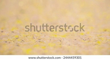 Abstract background. Yellow and beige background with thin focal part and defocus lights.