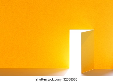 Abstract background for your notes made from yellow paper with cutting open door.
