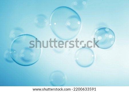 Abstract Beautiful Blue Soap Bubbles Background. Soap Sud Bubbles Water.	
