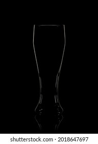 Abstract Beer Glass Contour Against Black Background