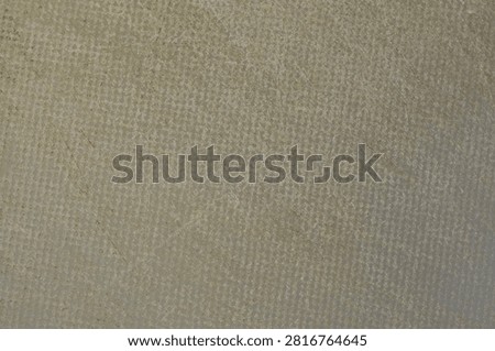 Abstract Beige Plastic Board Texture with Fine Scratches and Crosshatch Pattern