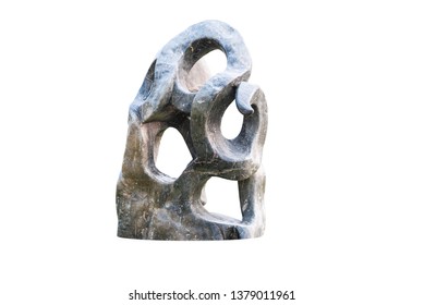 Abstract of big granite ,marble rock stone with holes in the garden zen japan style .Decorative Sculpture rock aged stone isolated on white background.Texture decoration at home concept,clipping path - Powered by Shutterstock