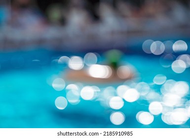 Abstract Biur Blurred Water Background With Bokeh Effect. Light Beam, Bokeh And Dust Background