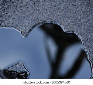 abstract black background of liquid asphalt bitumen - Shutterstock ID 2005394360